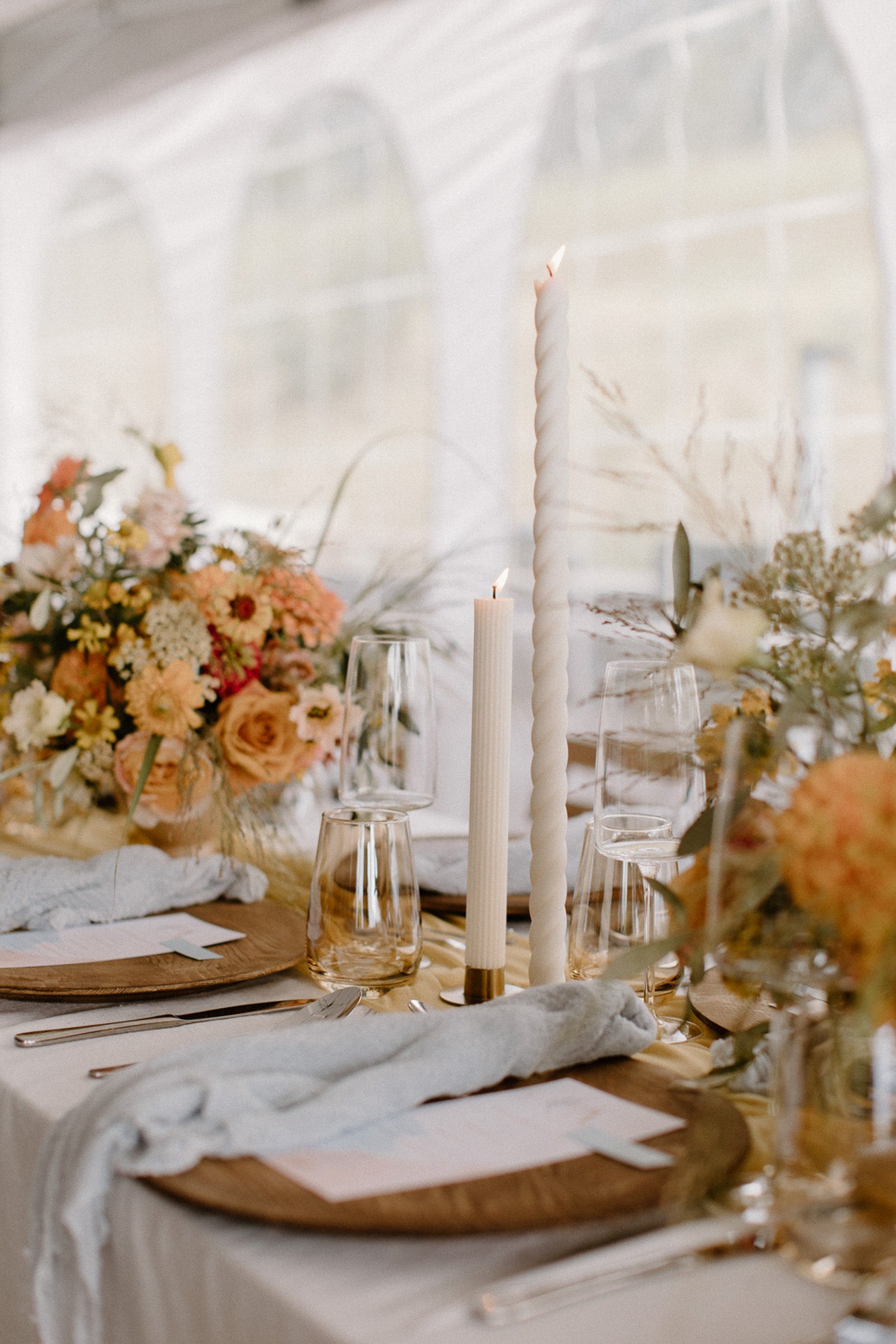 floral orange wedding rustic feeling with long taper candles by noosh.studio